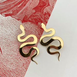 Aretes Serpiente XL en oro.
