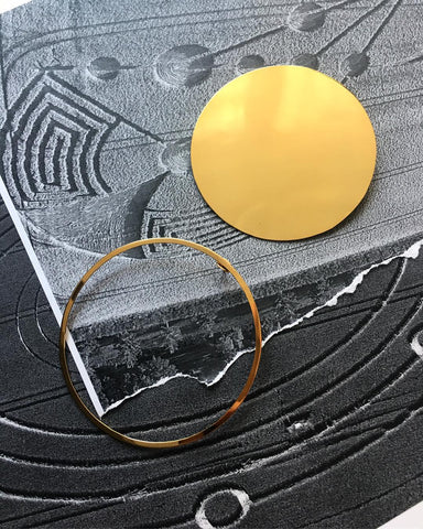 Aretes Agroglifos No. 2 en oro.