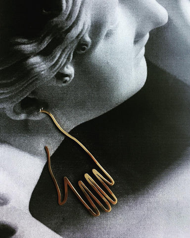 Aretes Quiromancia Linum en oro.