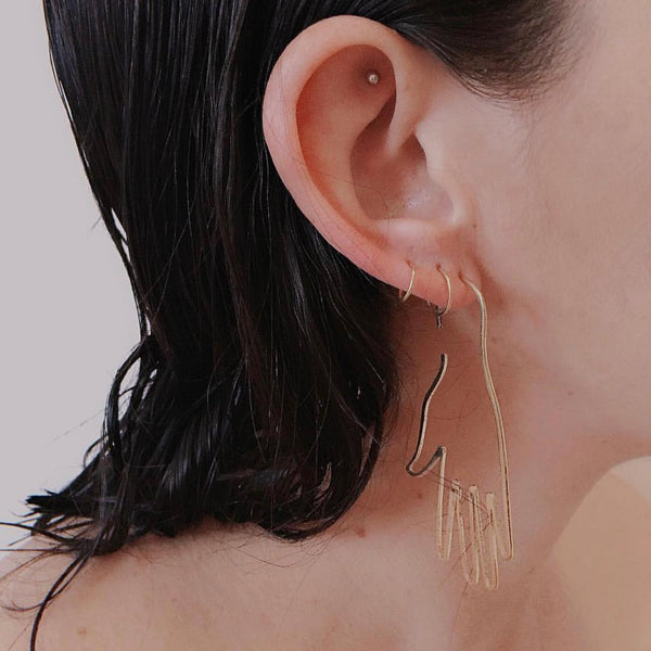 Aretes Quiromancia Linum en oro.