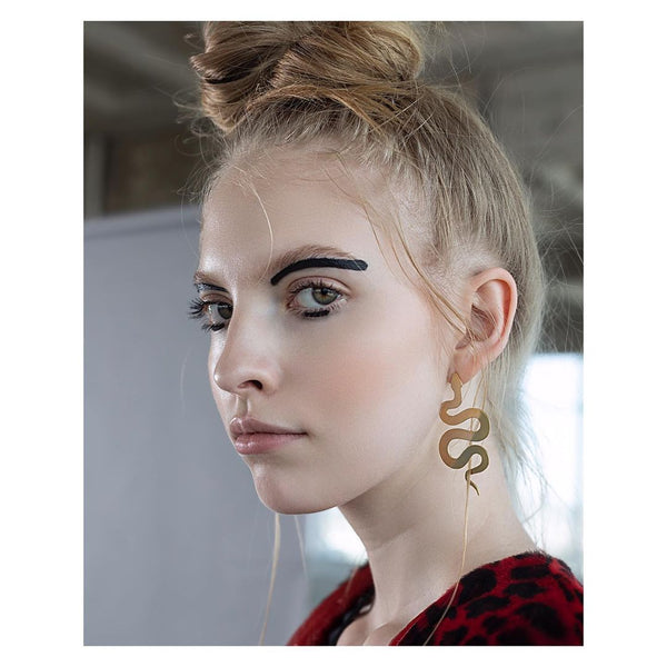 Aretes Serpiente XL en oro.